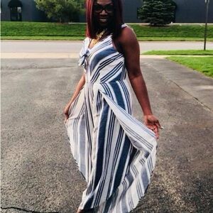 A white and blue striped romper size 6 with wide flare legs